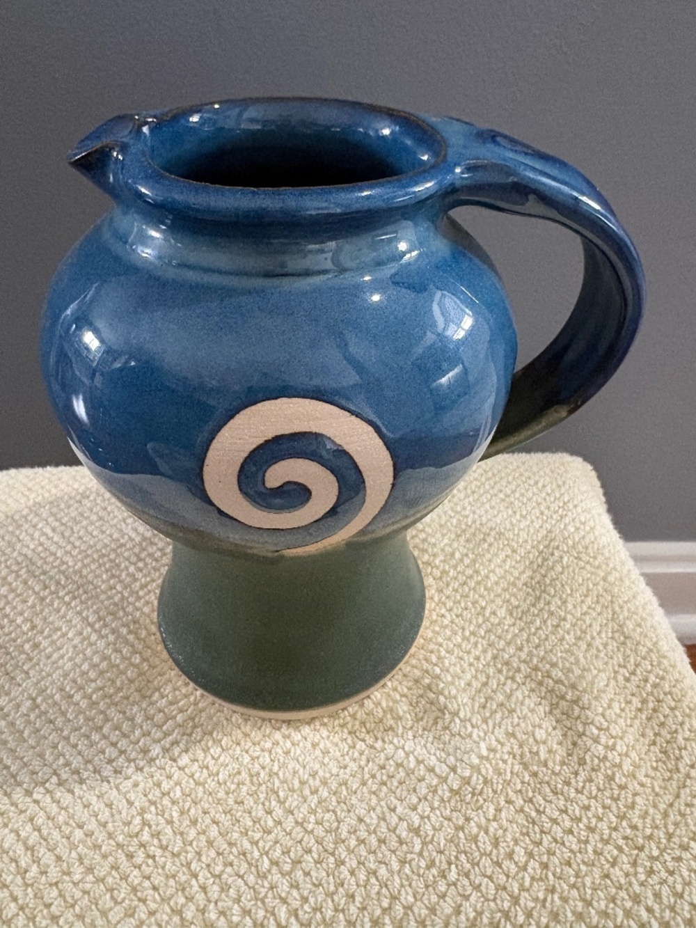 Jack O’ Patsy blue Irish studio pottery pitcher, swirl motif